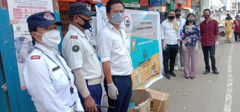 Team from Government Polytechnic Seithekema C, Dimapur with traffic police at Holy Cross Higher Secondary School, Dimapur gate on April 23.